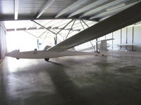 ZK-GNN @ NZTG - in gliding club hangar - by magnaman