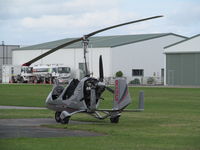 ZK-RGG @ NZTG - outside autogyro hangar - by magnaman