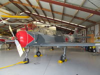 ZK-YAC @ NZTG - in museum hangar - flying condition - by magnaman