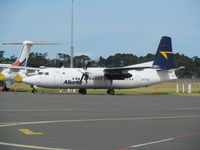 VH-FKO @ NZAA - on convair apron in between charter flights - by magnaman