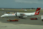 VH-QOT @ YSSY - FROM THE DEPARTURES LOUNGE - by Bill Mallinson