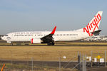 VH-VOK @ YSSY - taxiing to 34R - by Bill Mallinson