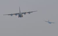 ZH880 @ EGFH - RAF Hercules aircraft ZH880 and ZH882 of the Brize Norton Transport Wing approach Swansea Airport for a low pass over Runway 22. - by Roger Winser