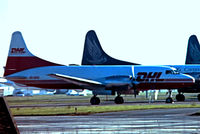 OO-DHD - Convair 580F SCD [135] (European Air Transport/DHL) (date and place unknown). Not the best of images. From a slide. - by Ray Barber