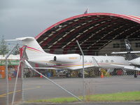 N666ZW @ NZAA - outside airwork hangar - by magnaman