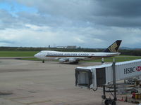 9V-SFO @ YBBN - taxying out for departure - by magnaman