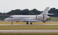 N775TM @ ORL - Falcon 2000S - by Florida Metal