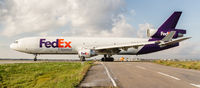 N645FE @ CYYZ - Taxiing for a 23 departure from Toronto Pearson - by BlindedByTheFlash