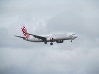 VH-YIY @ NZAA - landing at AKL on first revenue flight to NZ - by magnaman