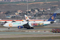 CS-TRH @ LEMD - With Evelop titles; taxying to depart Madrid. - by alanh