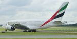 A6-EEW @ EGCC - Emirates 17 arrives  from DXB - by Mike stanners