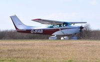G-IFAB @ EGFH - Visiting Reims/Cessna Skylane departing Runway 04. - by Roger Winser