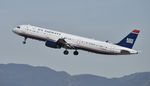 N549UW @ KLAX - Departing LAX on 25R - by Todd Royer