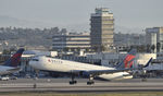 N195DN @ KLAX - Departing LAX on 25R - by Todd Royer