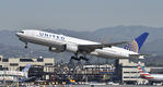 N211UA @ KLAX - Departing LAX on 25R - by Todd Royer