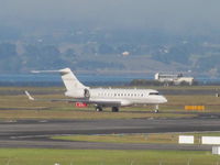 B-KMF @ NZAA - long shot on landing with Manukau Habour in background - by magnaman