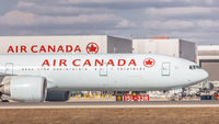 C-FIVQ @ CYYZ - Taxiing at Toronto Pearson - by Robert Jones