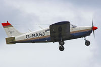 G-BASJ @ EGBP - Resident Cherokee, seen departing runway 26, local flight. - by Derek Flewin