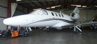 UNKNOWN @ KRHV - A local Cessna Citation Jet 1 sitting inside the Lafferty Aircraft Sales hangar. - by Chris L.