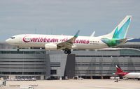 9Y-GEO @ MIA - Caribbean 737-800 - by Florida Metal