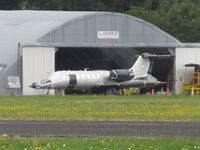 ZK-XVL @ NZAR - long range shot of this learjet awaiting its new paint job. Hope not boring all white again. - by magnaman