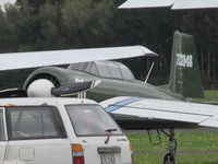 ZK-FRU @ NZAR - Cluttered shot - but too good an aircraft not to snap! - by magnaman