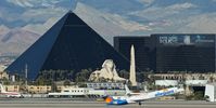 N418NV @ KLAS - Allegiant Air, seen here taking off in front of the famous Luxor Hotel at Las Vegas Int'l(KLAS) - by A. Gendorf