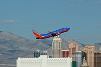 N499WN @ KLAS - Southwest Airlines, seen here during take off climb at Las Vegas(KLAS) - by A. Gendorf
