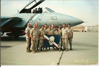 164350 - F-14D 164350 A/C 103  assigned to Fighter Squadron TWO (VF-2 Bounty Hunters ) deployed with CV-64 at Al Jaber Air Base Kuwait. VF-2's Beach Det led by their MMCO  LT Brian Burns was assigned to repair the  aircraft after sustaining tail hook damage. - by Brian Burns