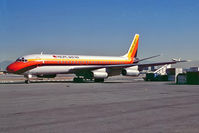 N39307 @ KLAX - Douglas DC-8-62H [45910] (Pacific East Air) Los Angeles-Int'l~N 24/10/1984. From a slide. - by Ray Barber