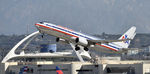 N915NN @ KLAX - Departing LAX on 25R - by Todd Royer