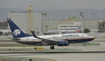 XA-NAM @ KLAX - Landing at LAX on 7R - by Todd Royer