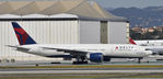 N702DN @ KLAX - Taxiing to gate at LAX - by Todd Royer