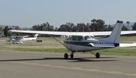 N23AT @ KRHV - Nice Air's 1978 Cessna 172N taxing down taxiway Z while Trade Wind's Cessna 182T is clear of runway 31R. - by Chris L.