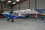 N102CA @ EGBR - Aviat A-1B Husky in a hangar at The Real Aeroplane Club,  Breighton Airfield, May 4th 2015. - by Malcolm Clarke