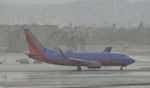 N761RR @ KLAX - Departing LAX on a rainy day - by Todd Royer