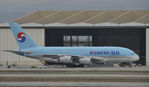 HL7613 @ KLAX - Taxiing to gate - by Todd Royer