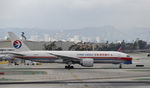 B-2078 @ KLAX - Taxiing to parking at LAX - by Todd Royer