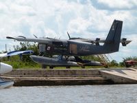 AB-583 - Parked on the shore, Iquitos - by confauna