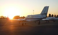 N991EM @ KRHV - A transient Cessna 414 with tip tanks parked at Nice Air visiting Reid Hillview Airport, CA. - by Chris Leipelt