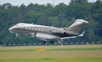 OE-HII @ LOWG - Challenger 300, wet take-off - by Paul H