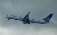 N590UA @ KLAX - United, seen here climbing out Los Angeles Int'l(KLAX) - by A. Gendorf