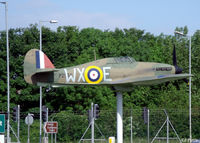 BAPC267 @ EGSU - Another view of the gate guard, a plastic Hurricane, at the IWM Duxford - by Clive Pattle