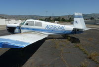 N2934L @ KRHV - A local 1967 Mooney M20C rotting at its usual parking spot at Reid Hillview Airport, CA. Believe it or not this guy still pays his parking fee. - by Chris Leipelt