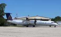 N338NG @ KRFD - DHC-8-402 - by Mark Pasqualino