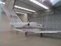 ZK-YDZ @ NZAR - Hiding in owner's hangar at Ardmore - ex VH-YDZ so no expense spared on painting new registration!! - by magnaman