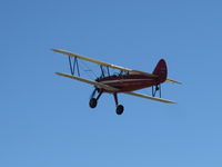 N66711 @ SZP - 1941 Boeing IB75A, Jacobs R755B2 275 Hp upgrade, takeoff climb Rwy 04 - by Doug Robertson