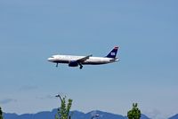 N663AW @ YVR - US506 from Phoenix - by metricbolt