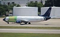 N156GA @ TPA - Blue Panorama 737-400 - by Florida Metal