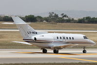 LY-HCW @ LMML - Raytheon Hawker 800XP LY-HCW Classic Jets - by Raymond Zammit